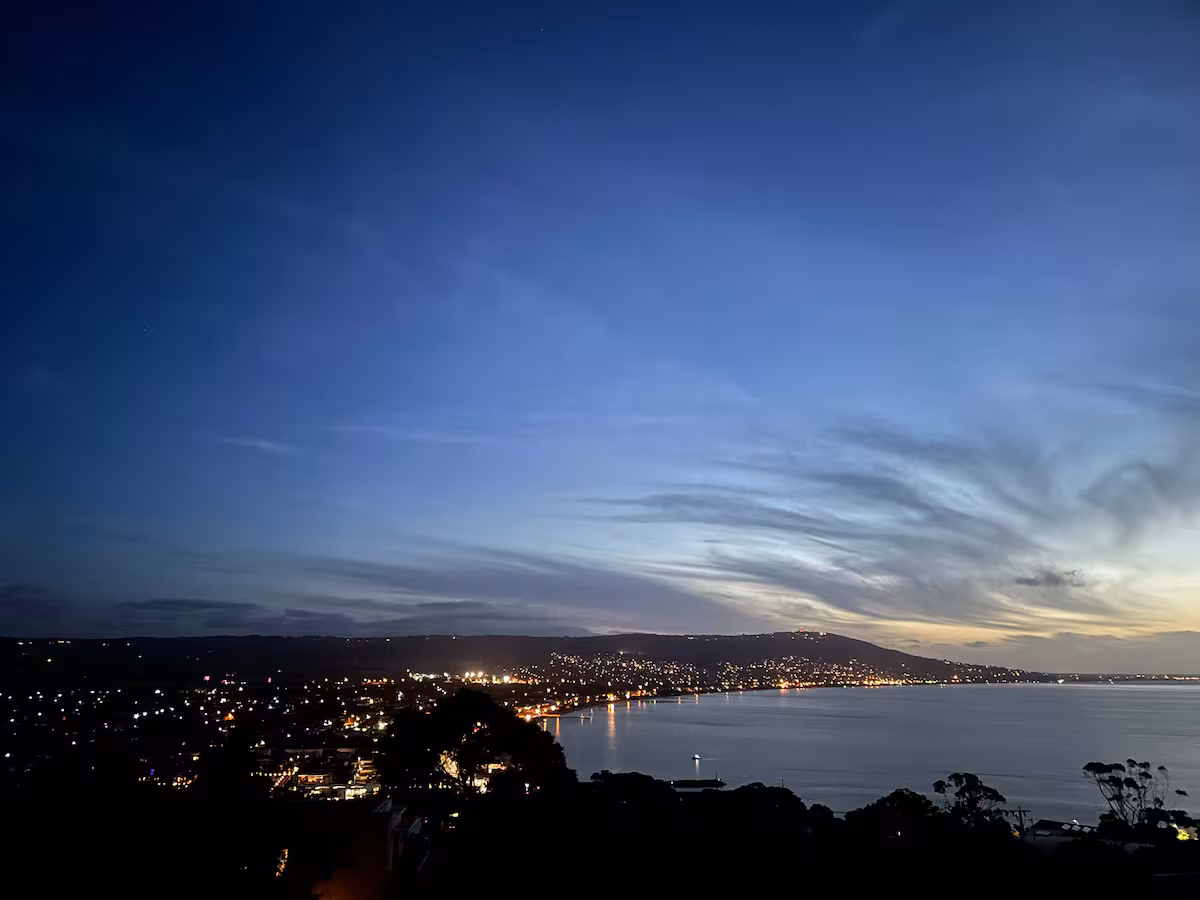 Twilight over Port Phillip Bay with the lights of Mount Martha below, seen from Mar Vista